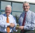 Peter Driver (left) receives his TOCA award from Ransomes Jacobsen's Managing Director Alan Prickett