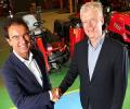 Gerrit van der Scheer, CEO of Royal Reesink, left, shakes hands on the acquisition of Lely Turfcare with CEO of Lely Holding Alexander van der Lely