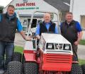 L-R:David Nicol, Sales & Service Director, Frank Nicol, Managing Director and Frank B Nicol, Director with a Ventrac 4500 compact tractor