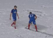 Steven Taylor clears the lines of snow with 10 minutes left to play