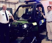 PSNI superintendent Sean Wright takes the keys of the specially liveried John Deere Gator utility vehicle (aka the Copagator) from Randal McConnell of John Deere dealer Johnston Gilpin & Co (right), with Constable Ricky Taylor (left) looking on