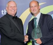 Dale Burden, Managing Director from Burden Bros Agri receives award from Dale Penfold, from COOK Ltd