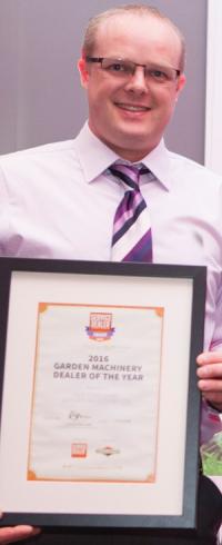 Hertfordshire GM's Tim Wall with 2016's Garden Machinery Dealer Of The Year Award