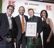 L-R: Service Dealer owner Duncan Murray-Clarke and Kramp UK Sales Director Des Boyd join Pete and Emma McArthur to celebrate their Overall Dealer of the Year win at last year's ceremony