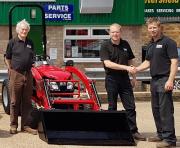 Mick Challen, left, owner of new TYM dealer Rafferty Newman, with Reesink’s Scott Turner who is shaking hands with Rafferty Newman’s Joe Challen
