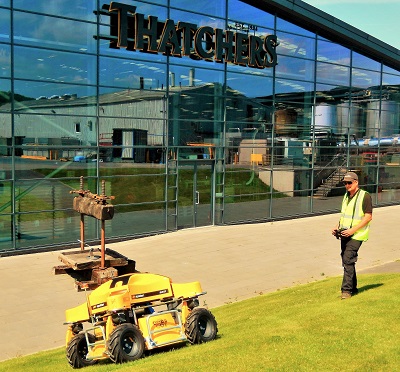 Groundscare and maintenance technician John Bryant operating the Spider 1 on a slope outside the Jubilee building