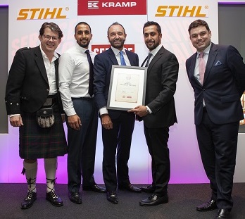 Amar and Rajiv Parmar with Des Boyd and Duncan Murray-Clarke (l) and Charlie Baker (r) celebrating their Overall Dealer of the Year win