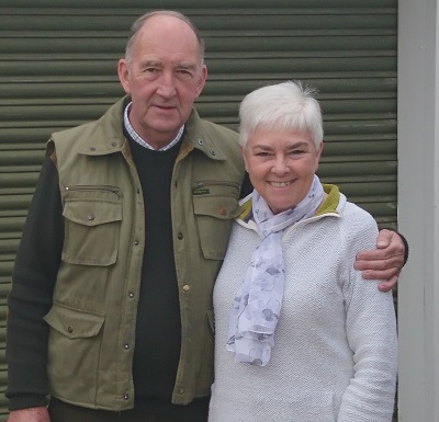 Malcolm Evans and his wife outside the Duxford Hire & Supply premises