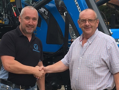 Tim Ward of Cornish Tractors (right) with farmer David Mallett receiving the keys to his new Landini 7-160 tractor