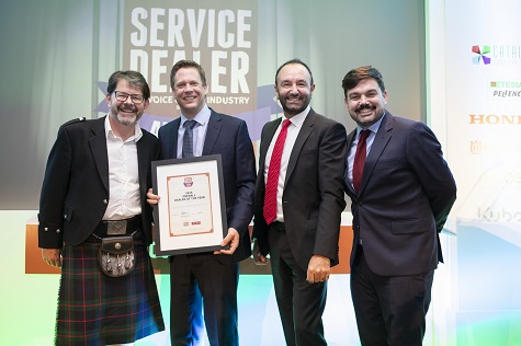 Des Boyd, Sales Director of Kramp UK (2nd from right) presents Jason Nettle of Winchester Garden Machinery with their Overall Dealer of the Year Award at 2019's Service Dealer Awards