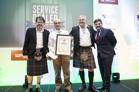 Mike Cameron, sales manager at Catalyst (second left) presenting the Star Of The Dealership at 2019's ceremony