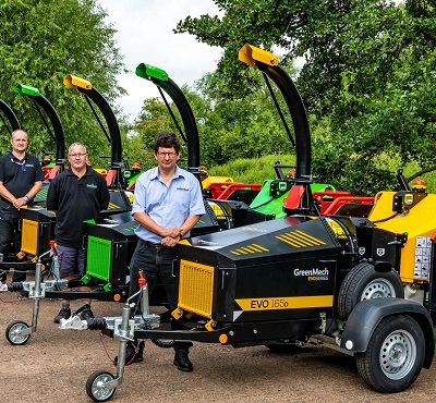 Jonathan Turner (pictured front) with members of the GreenMech design, engineering, production and sales team as the first batch of EVO 165 chippers leave the factory