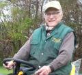 Michael J O'Connor at home on his new John Deere X135R lawn tractor