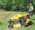 Field operators Andy Bradley and Glen Kirton operating the mowers at Frisby Lake