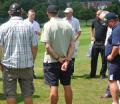 Head Groundsman Lee Marshallsay speaks to guests about pitch maintenance at the school