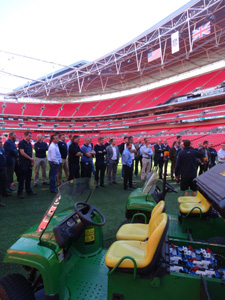 The guest turf professionals are introduced to some of the stadium's kit