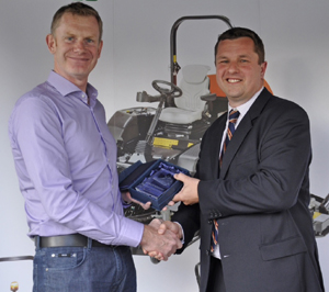 Fairways GM Managing Director, David Rae, receives the Jacobsen sales award from Rupert Price