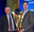 L-R: Jacobsen President David Withers presents the trophy to Edwin Budding Award winner Stephen Tucker