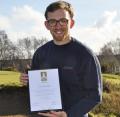RJ National greenkeeper James Gotts proudly displaying the GEO Re-certification