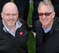 Adrian Hurst, managing director at Tydd St Giles with Lely's Julian Copping