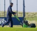 One of the new John Deere 220SL walk-behind greens mowers at work, preparing Royal Troon’s greens for the 145th Open Championship in July
