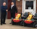 Dale Hire Director Gordon Rogers receiving five of the seven new Canycom Brushcutters from ICB Plant & Machinery Director, Ian Staniforth, at their Maldon Head Office