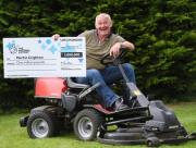 Lottery winning groundsman Martin Crighton pictured in the East Anglian Daily Times