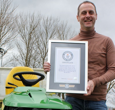 Andy Maxfield with his GUINNESS WORLD RECORDS certificate for the fastest journey from John O’Groats to Land’s End on a lawn mower, achieved on 30 July 2017