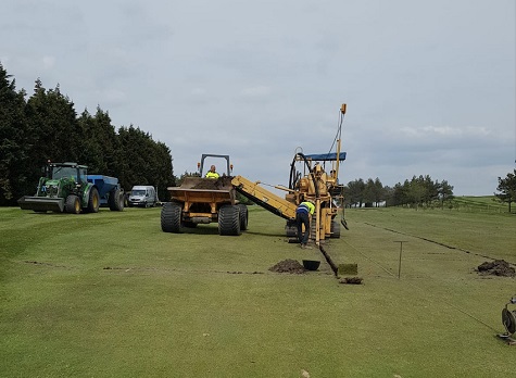 Trenching out drains on first section of the 3rd fairway