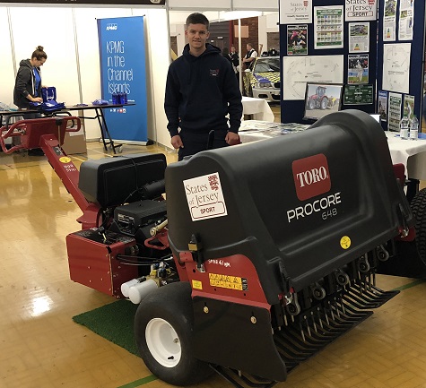 Current apprentice at States Of Jersey Peter Ahier with the Toro ProCore 648 aerator at the Jersey Skills Show