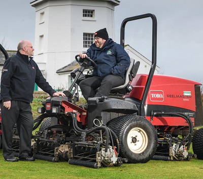 Course manager Mark Heveran sits on the club’s Toro Reelmaster 5510 with Reesink Turfcare’s Julian Copping on his left, at Royal Cromer Golf Club