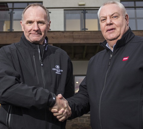 Jim McKenzie MBE, director of golf courses and estates management at Celtic Manor, left, shakes on a 25 year relationship with Reesink’s Trevor Chard.