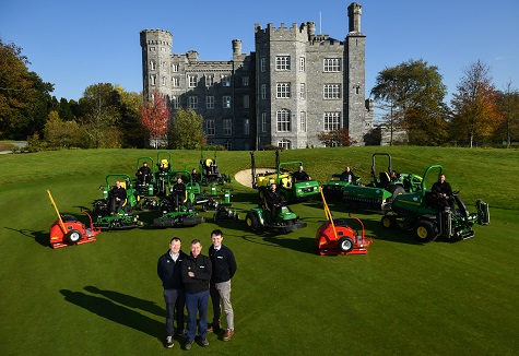 Noel Bennett and director Robert Mitchell of John Deere dealer Dublin Grass Machinery with (centre) Killeen Castle course superintendent Mark Collins and the greenkeeping team (seated behind on the new John Deere machines).