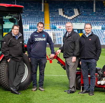 Head groundsman Kiel Barrett centre left, joined by TYM’s Steven Haynes left, Reesink Turfcare’s Mike Turnbull centre right, and Russell Groundcare’s Ian Waddington on the pitch at Elland Road