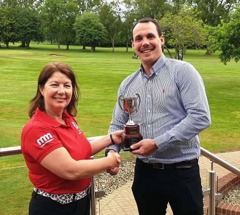 Matthew Mears presenting the ClearWater Cup to Managers Captain Jane Harfield 2019