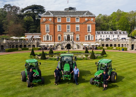 Members of the Royal Automobile Club greenkeeping team (left to right) Simon Glover, Andy Airlee, Lee Strutt and Gary Stewart with the club’s two John Deere 4066R compact tractors and the new 5125R utility tractor. (Photo credit: Ash Youd Photography)