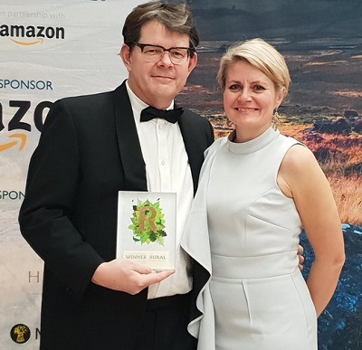TAP owners Duncan Murray-Clarke and Emma Craigie with the award for Best Rural Digital, Communications or Media Business