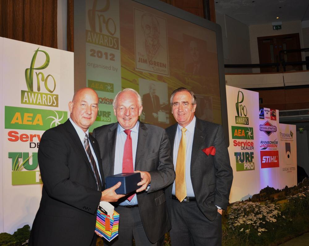 Chris Biddle (centre) collects his lifetime achievement award from Ray Spinks (left) of AgriArgo, with Kim Macfie