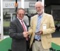 Barry Halls receiving award from Commonwealth War Graves Commission at SALTEX