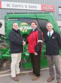James Kissock (left) welcomes Andrew Curtis to the Great Plains UK dealer network, watched by David Holmes