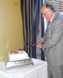 Chris Whetnall cutting his cake