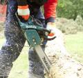 Makita chainsaw in action