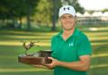 Jordan Spieth with his John Deere Classic trophy