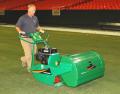 Eric Holland of Precision Turf uses a Ransomes Mastiff to maintain the natural pitch his team installed in the Georgia Dome