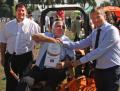 Simon Tullett [on machine], Dennis Opalacz from SCAG [left] and Geoff Webb, the Chief Executive of the IOG [right]