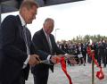 JCB CEO Alan Blake (right) officially opens the new Russian dealership with Stroykomplekt President Viktor Poddubitsky