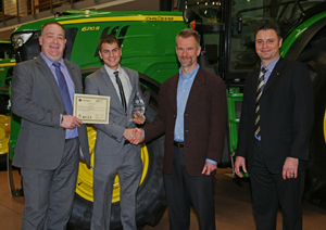 John Deere ag & turf apprentice of the year Iain Bond of Sharmans Agricultural (second left) with (left to right) James Kesterton of Babcock, Dr Lutz Schueppenhauer and Chris Wiltshire of John Deere