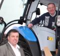 Terry Coles shows Gareth Rees around a New Holland Tractor