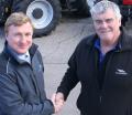 Phil Maw, area sales manager at distributor AgriArgo UK, welcomes Chris Willner to the McCormick sales and service dealer network