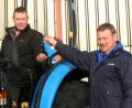 Tony Blackburn of Newton Trailer Centre (right) hands over the keys for the new Landini 1-55M tractor to Buttermere sheep farmer Alan Beard